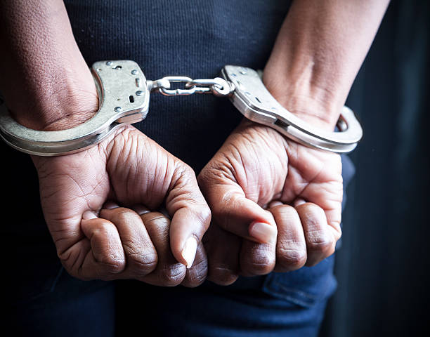 Black Woman In Handcuffs