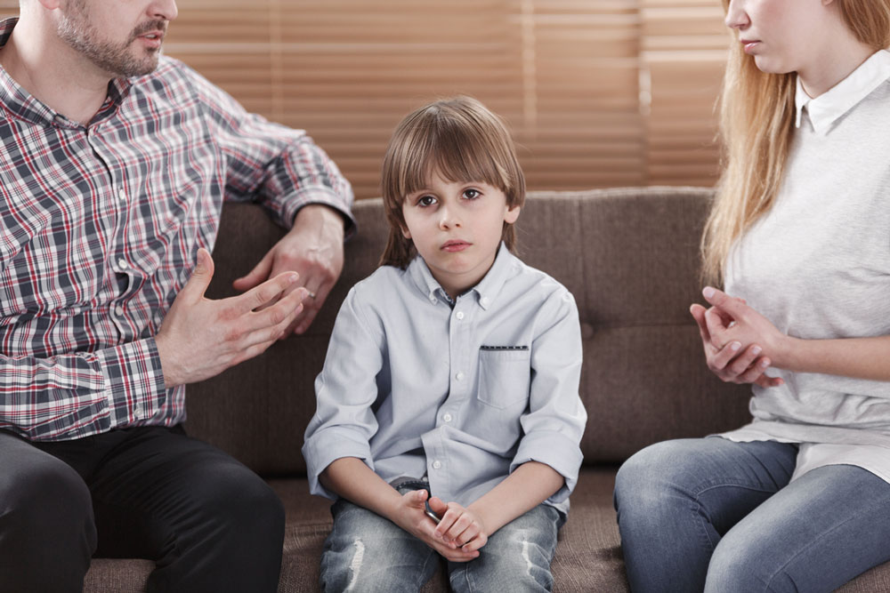 Close Up,of,sad,child,and,his,parents,arguing.,problem,in